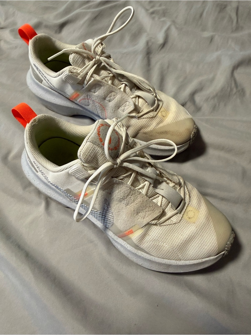 Nike Women's White Mesh Sneakers with Orange Accents